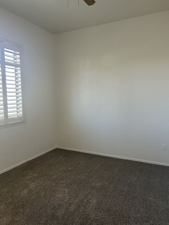 Building Photo - Unfurnished four bedroom large home!  Three car garage