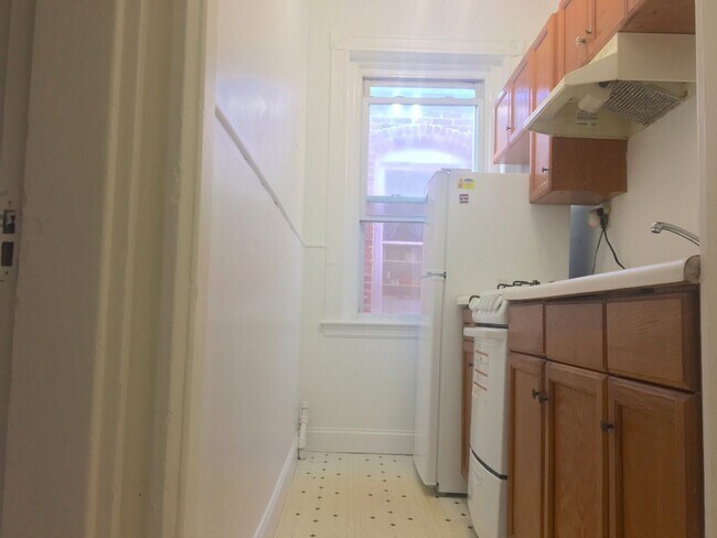 Building Photo - No brokers Fee, No Security Deposit, Heat Hot Water Included, Steps from the T Stop, Parking for ...