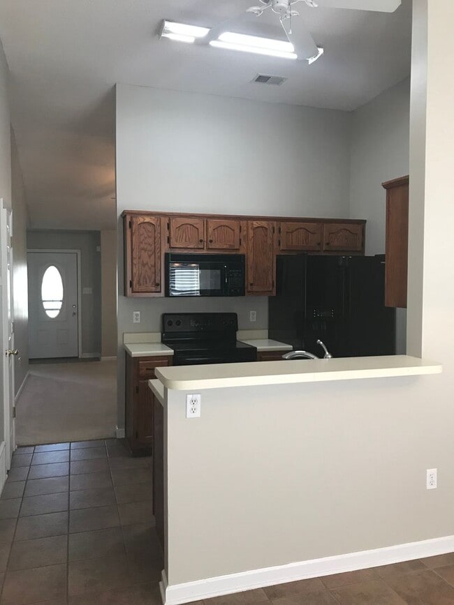 Building Photo - Olive Branch - 3 Bedroom, 2 Full bath Split Plan with Patio and Wood Privacy Fenced in Yard - Ove...