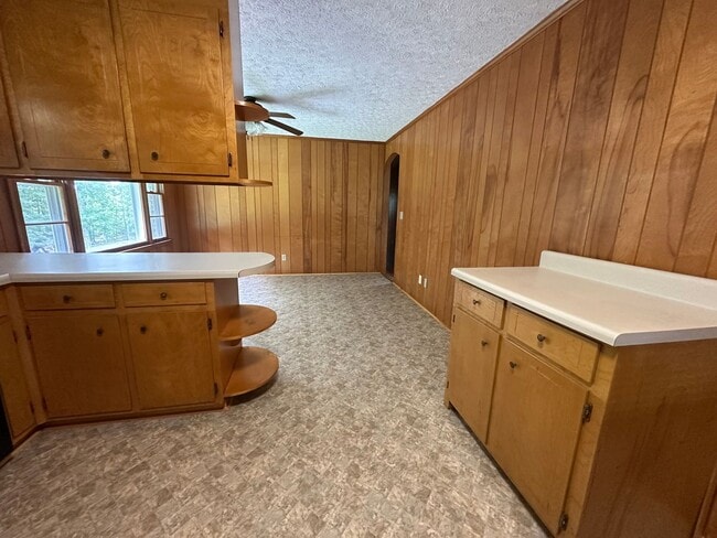 Building Photo - Spacious brick house with a caport and unf...