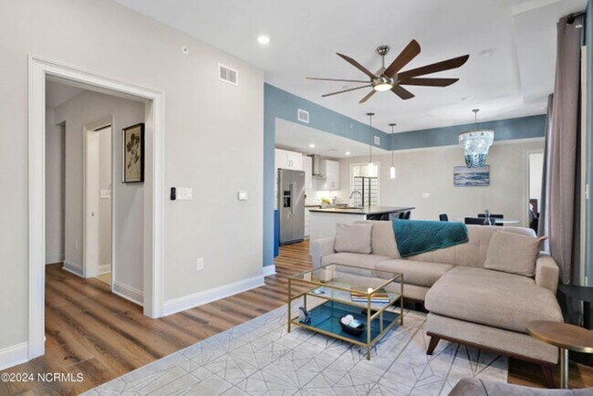 Building Photo - Welcome to your dream condo in the heart o...