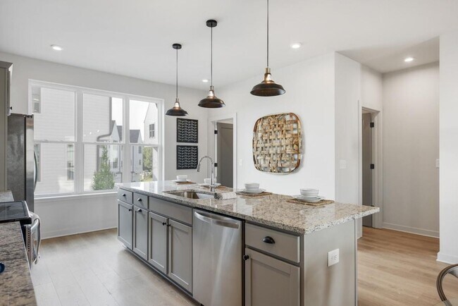 Building Photo - Gorgeous 3 bedroom end unit townhome with garage