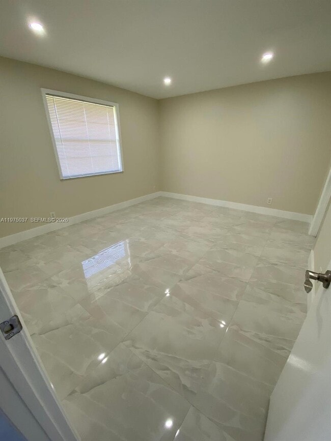 Building Photo - 8830 Royal Palm Blvd