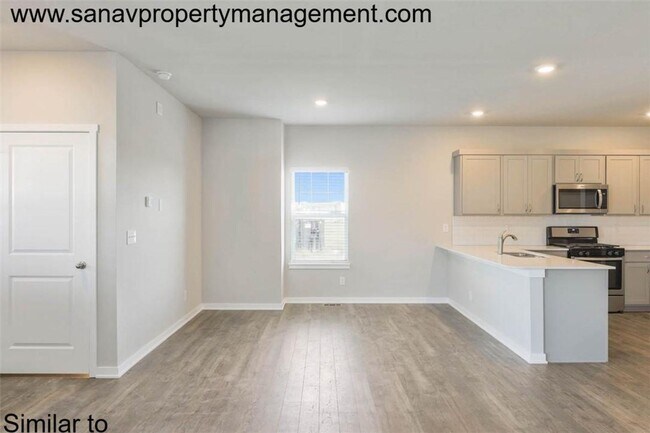 Building Photo - "Stylish 4-Bedroom Home in Prairie Trail with Modern Amenities"