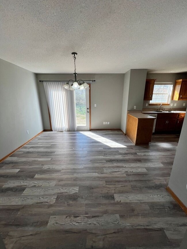 Building Photo - 3 Bed, 1.5 Bath Duplex with Garage and Extra Storage Space!