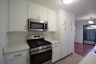 Building Photo - Tudor Garden Apartments