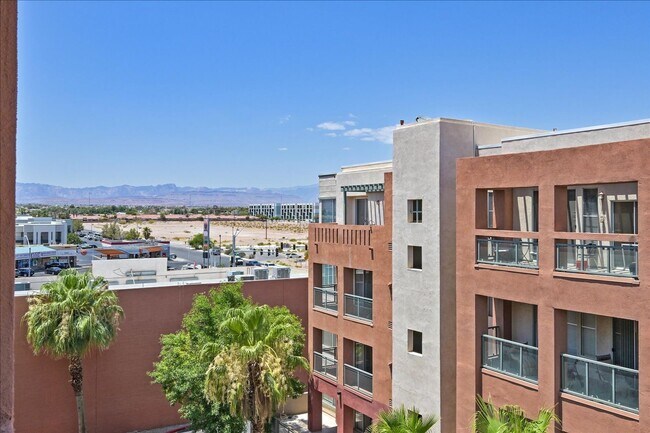 Building Photo - Top level 2 bedroom condo located in guard...