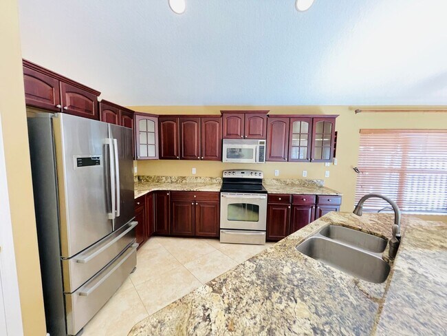 Building Photo - Available now! Charming 4-bedroom, 2.5-bathroom pet friendly home!!