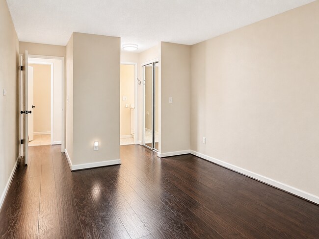 Building Photo - Modern Wooded Condo with Upgraded Kitchen & Private Deck