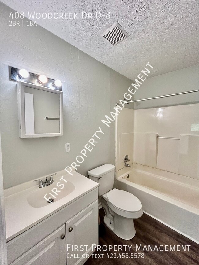 Building Photo - 408 Woodcreek Dr