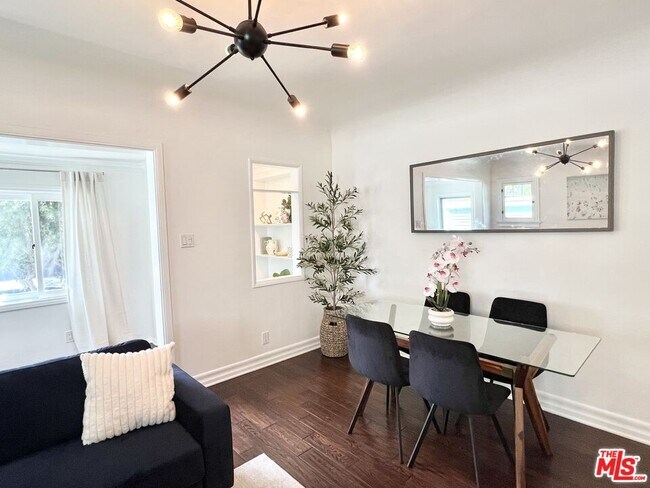 Building Photo - 7865 Willoughby Ave