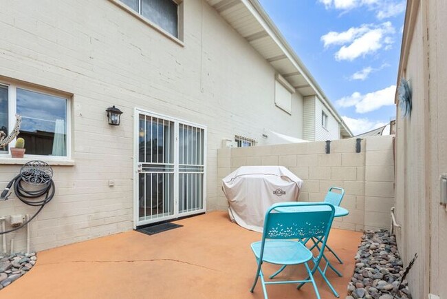 Building Photo - Discover this charming two-story townhome