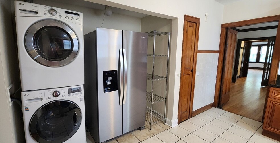 Kitchen with new SS appliances and in-unit washer/dryer - 2018 Lake St