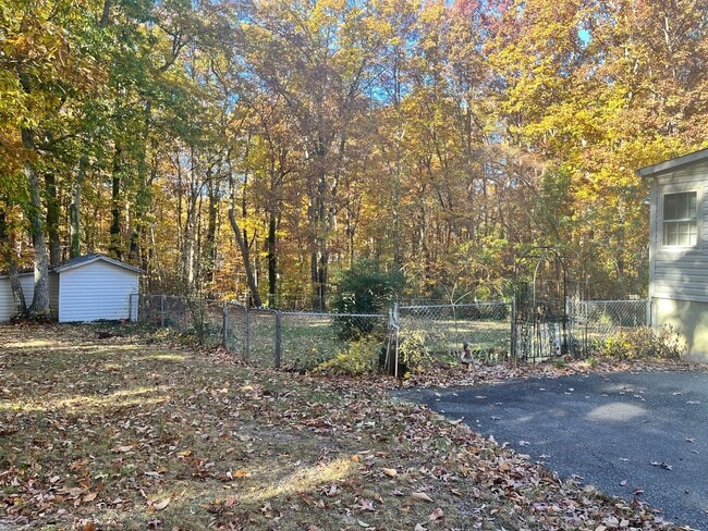 Building Photo - Beautifully secluded home right in the Vil...