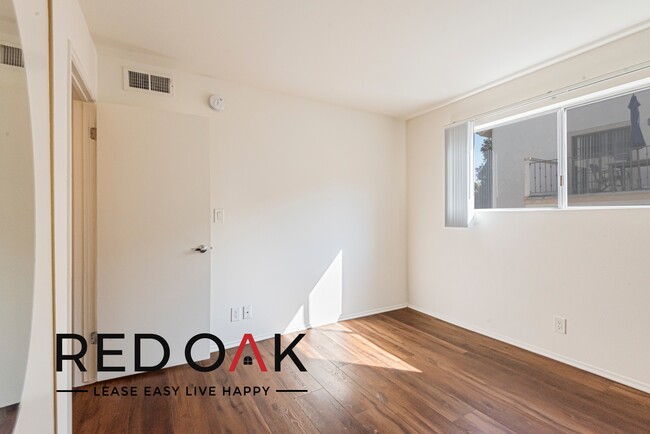 Building Photo - Amazing Two Bedroom + Office! Drenched in ...