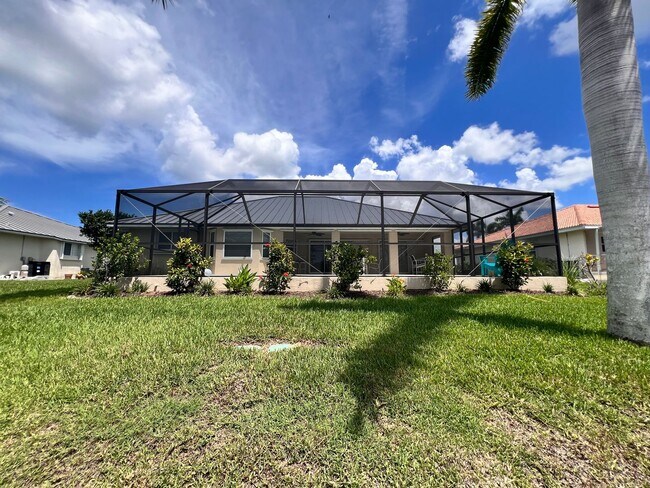 Building Photo - Waterfront Paradise in Punta Gorda Isles –...