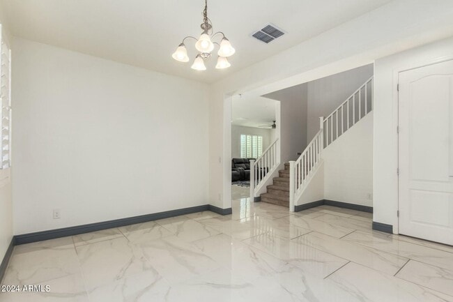 Building Photo - 9567 W Robin Ln