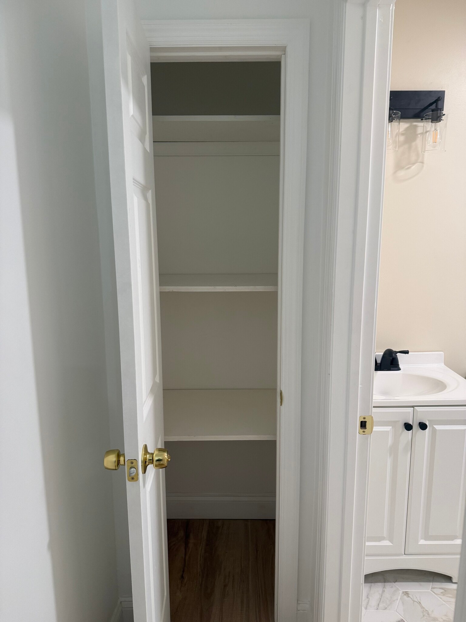 Hall closet with shelves - 410 E Point Pleasant Ave