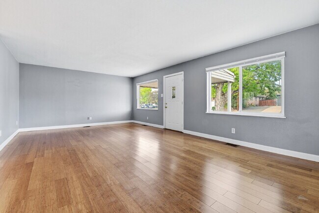 Building Photo - $3,045.95, 3 bed, 2 bath house in Denver with Fenced in Yard and In Unit Laundry!