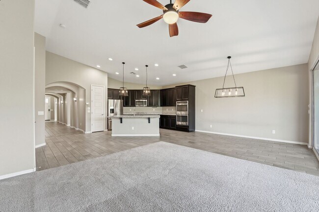 Building Photo - Stunning 4-Bed + Den Eastmark Home with Modern Upgrades Throughout