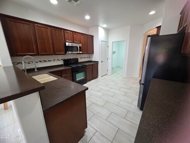 Building Photo - 42432 W Almira Dr