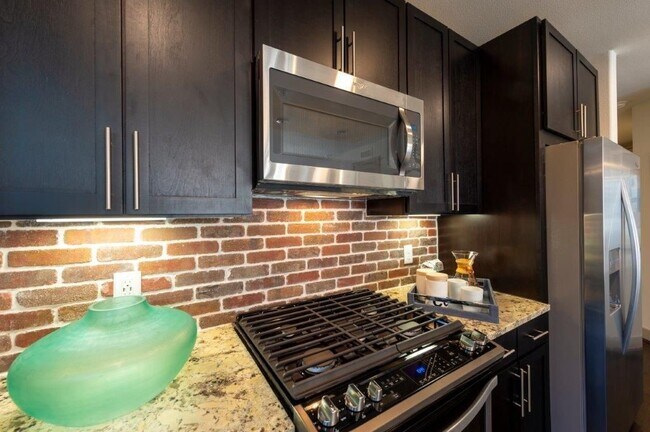 Building Photo - Lower Rates + 1 Month Free on a 2/2!
