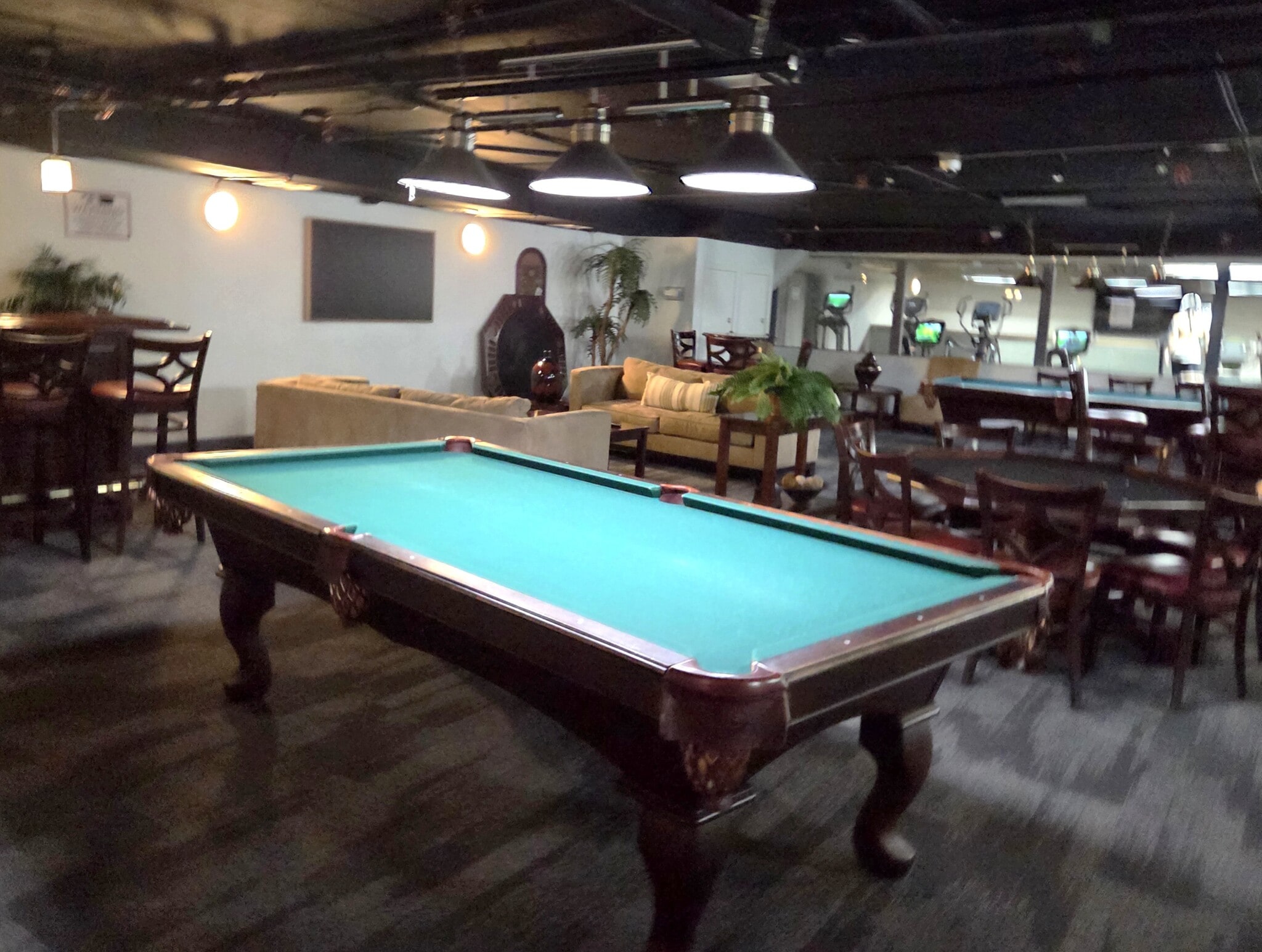 Pool table in lounge. - 10982 Roebling Ave