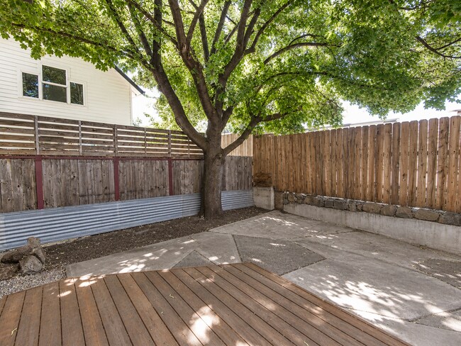 Building Photo - Heart of Bend Oasis: 3-Bedroom Home with Live-Edge Accents, New Carpet, and Fenced-In Parking