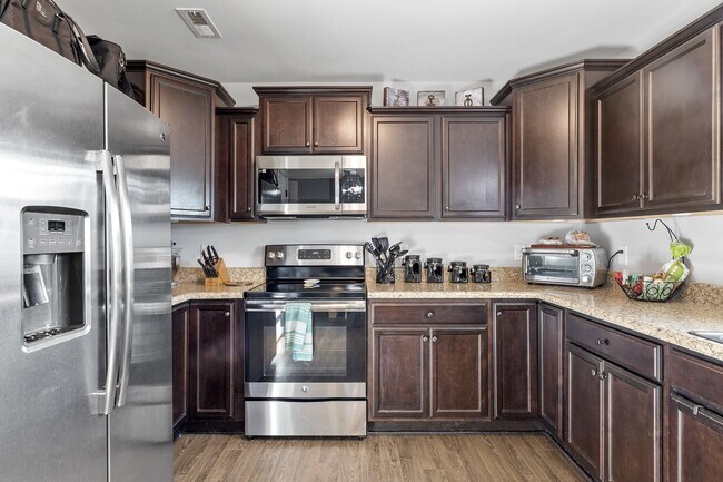 Building Photo - 3 Bedroom + Bonus Room Home with Main Floor Primary Suite & Community Pool Access