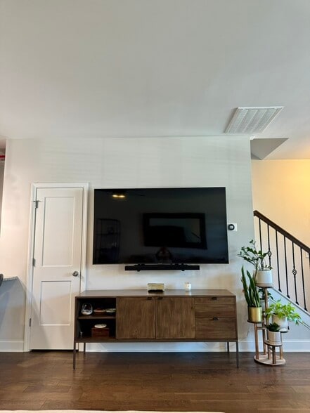 1/2 Bathroom to the left of TV - 143 Grandstand Blvd