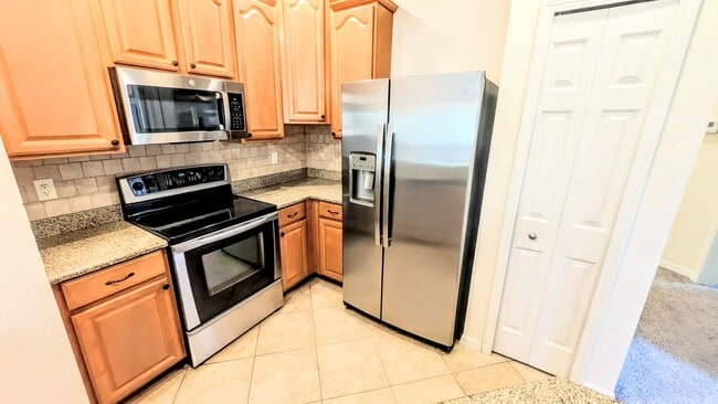 Building Photo - Annual unfurnished-3 bedroom, 2 bath condo with garage in gated community!