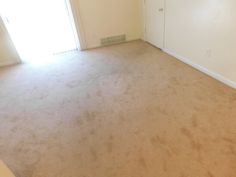 Living with newer carpeting and patio doorsfron - 6910 Colonial Woods Dr