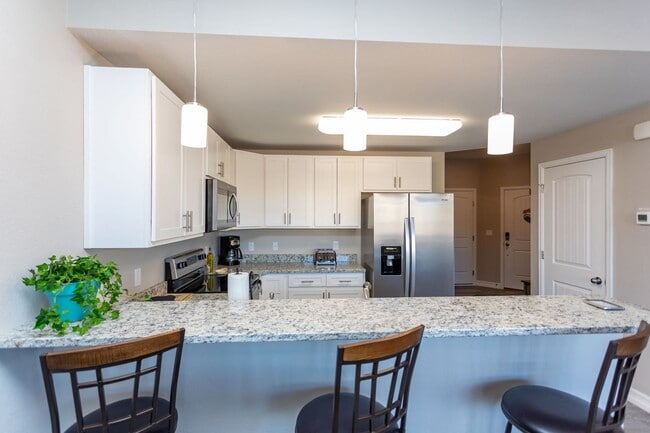 Building Photo - Stylish 3-Bedroom Townhome with Fireplace, Modern Kitchen & Spacious Layout!