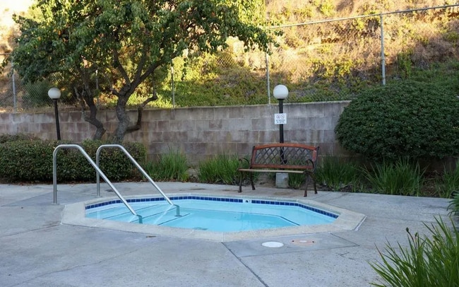 Building Photo - TWO PARKING SPACES INCLUDED! In Unit Washer & Dryer! Large Private Patio for Bikes, Boards and Bb...