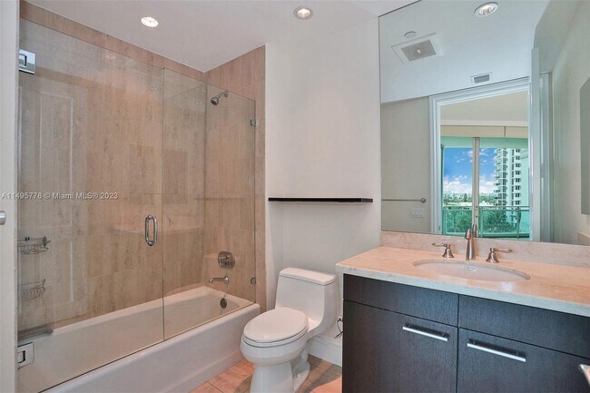 Building Photo - 10295 Collins Ave