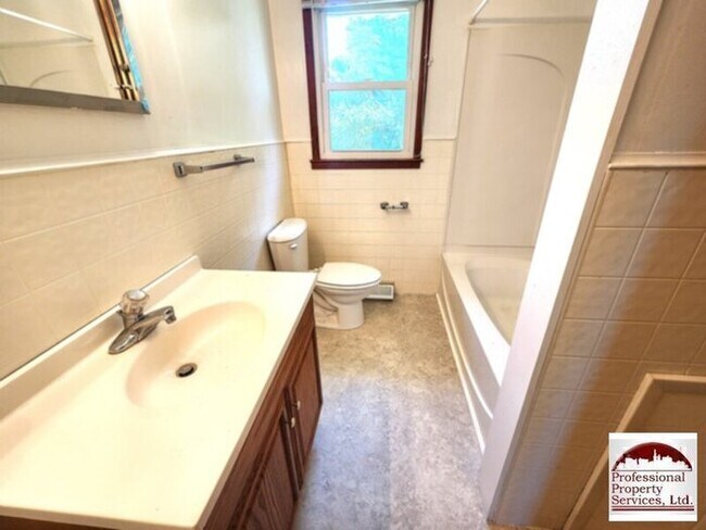 Building Photo - Charming Brick Rancher Offers A Perfect Blend Of Country Living And Convenience