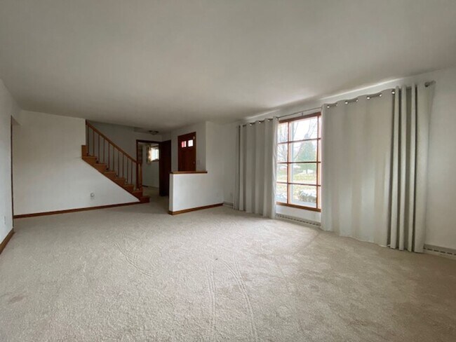 Building Photo - Welcome to this charming three-bedroom, tw...
