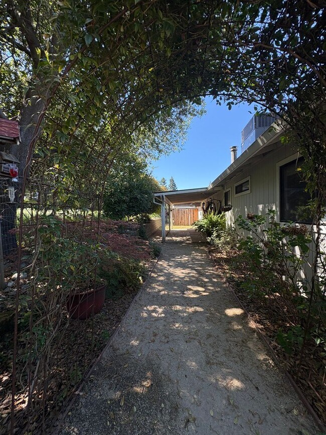 Building Photo - Your Private Escape – Charming Ranch-Style Home with Room to Breathe!