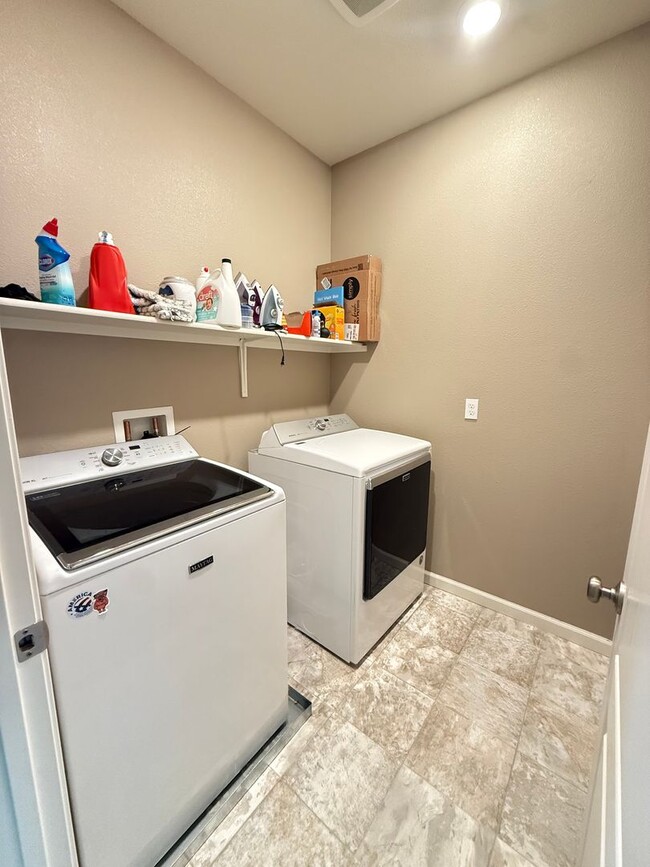 Building Photo - Spacious 5-Bedroom Home | Private Yard + Attached Garage