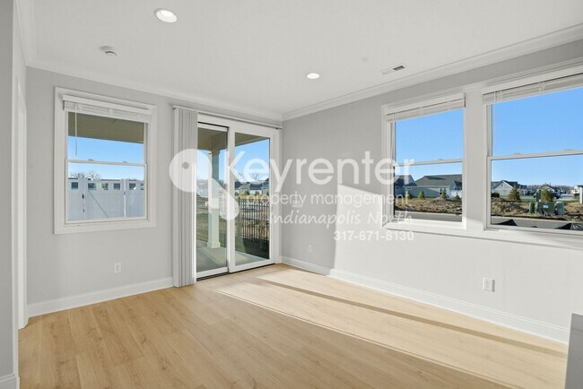 Building Photo - Located in Westfield, IN, this attractive 3-bedroom, 2.5-bath home sits on a corner lot within an...