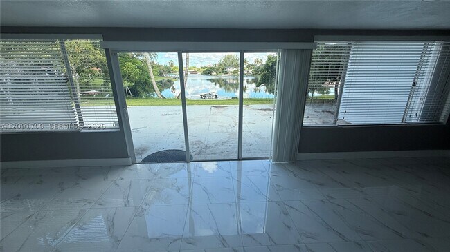 Building Photo - 6365 Miami Lakeway S