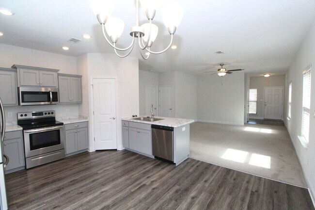 Building Photo - 4BR/2.5BA Home Near NAS Pensacola with First-Floor Primary, Stainless Kitchen & Covered Patio