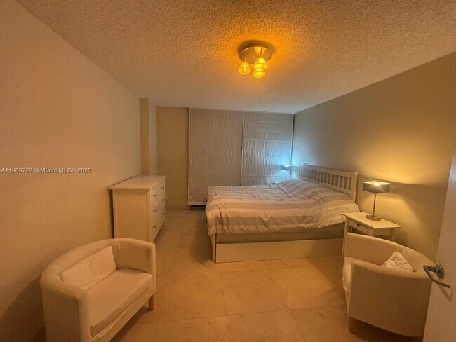 Building Photo - 8911 Collins Ave