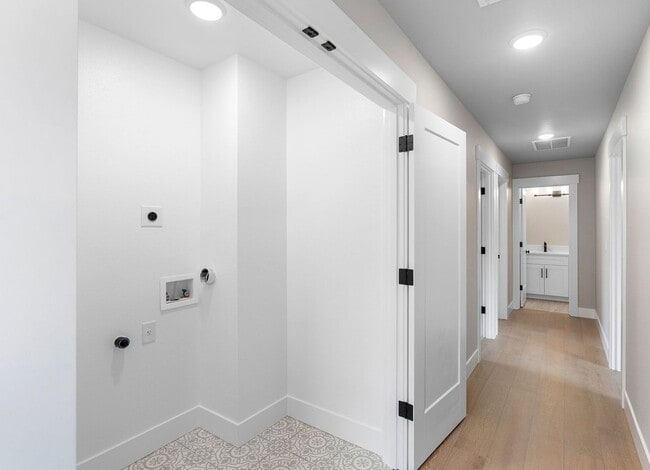 Building Photo - Brand-New 4-Bedroom Home Offering Modern Design, High-End Finishes, Attached Garage & Private Bac...
