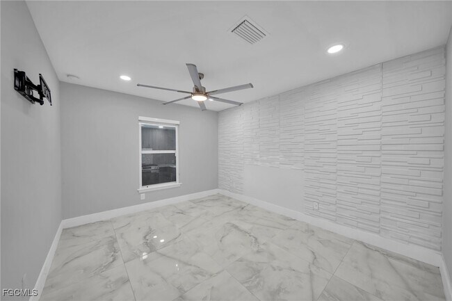 Building Photo - 3095 NW 4th Pl