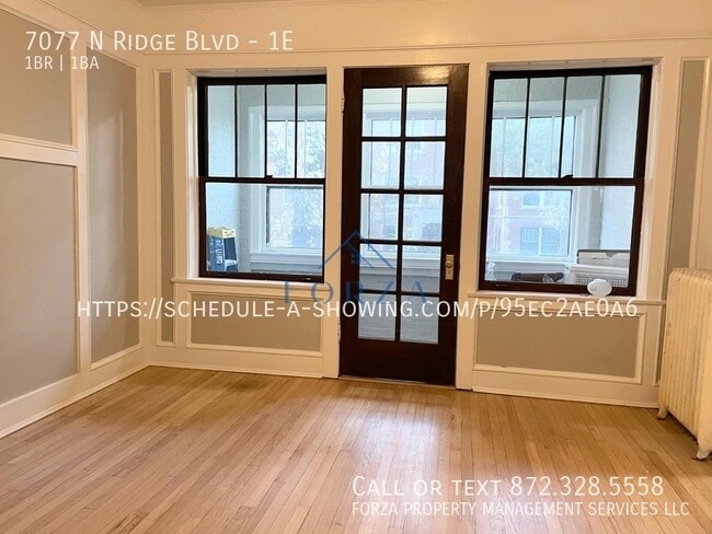 Building Photo - 7077 N Ridge Blvd