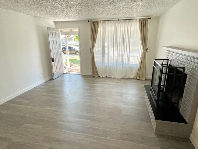 Building Photo - Centennial Remodeled Ranch Home with Large, Fenced Backyard, Attached Garage, Laminate Hardwoods