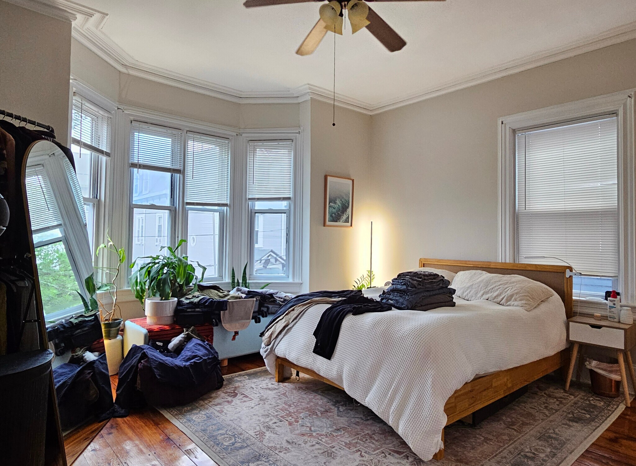 Master bedroom suite with bay windows, large closet, and en-suite bathroom - 128 Vinton St