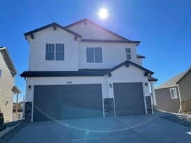 Building Photo - 6866 Petunia Pl