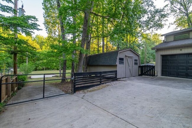 Building Photo - Spacious 4-Bedroom Mint Hill Retreat with Fireplace, 2-Car Garage & 3,600+ Sq Ft